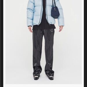 Matin Kim Curve Detail String Pants in Patent Black, Size Small